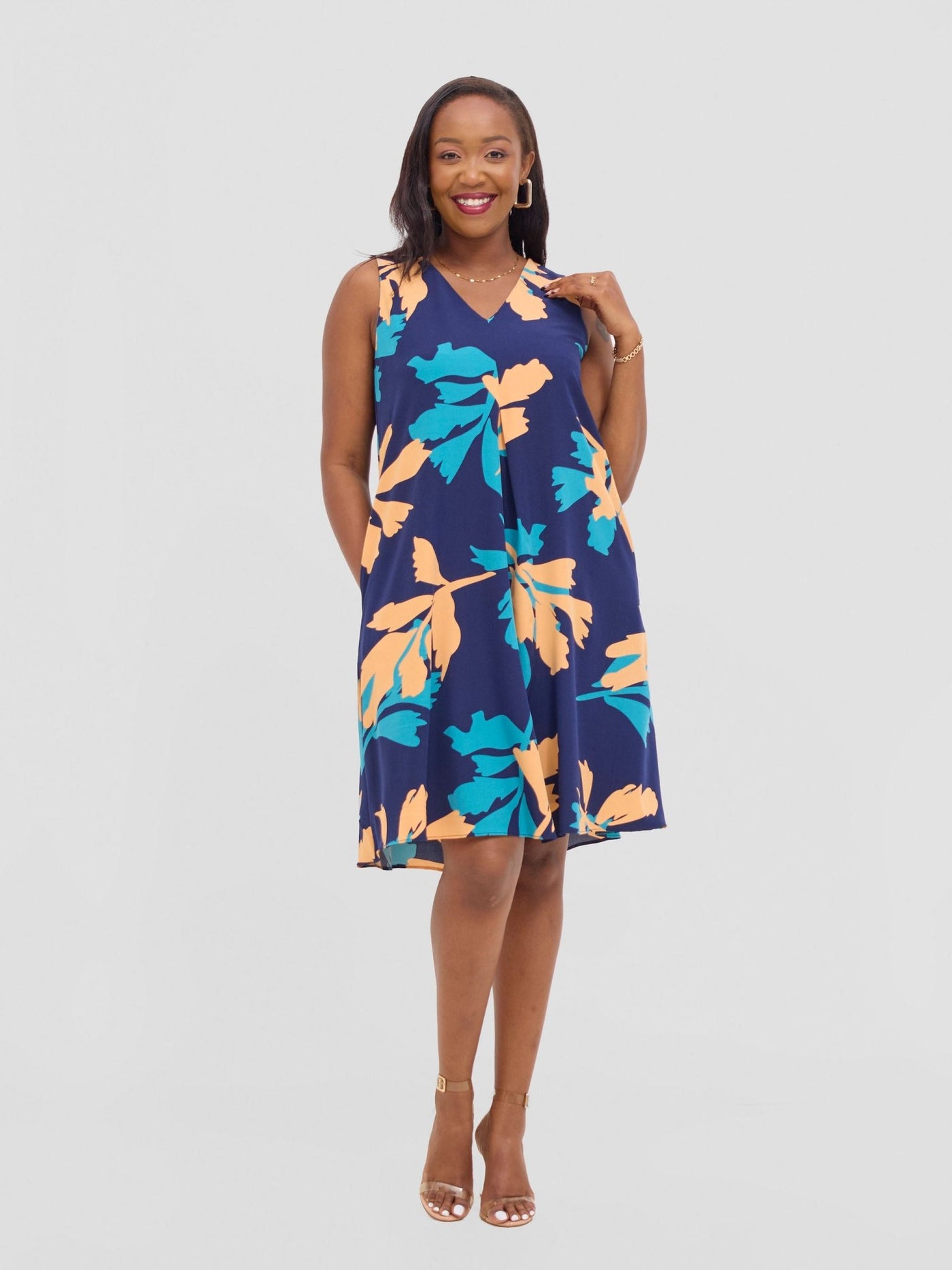 Vivo Ava Front Pleat Knee Length Dress - Peach / Teal Print - Shopzetu