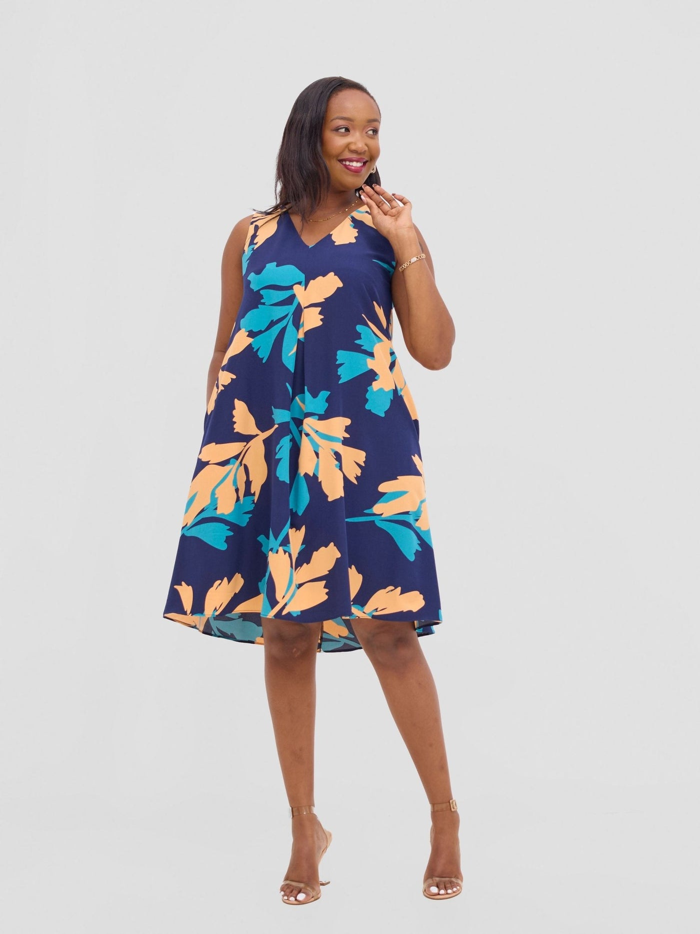 Vivo Ava Front Pleat Knee Length Dress - Peach / Teal Print - Shopzetu