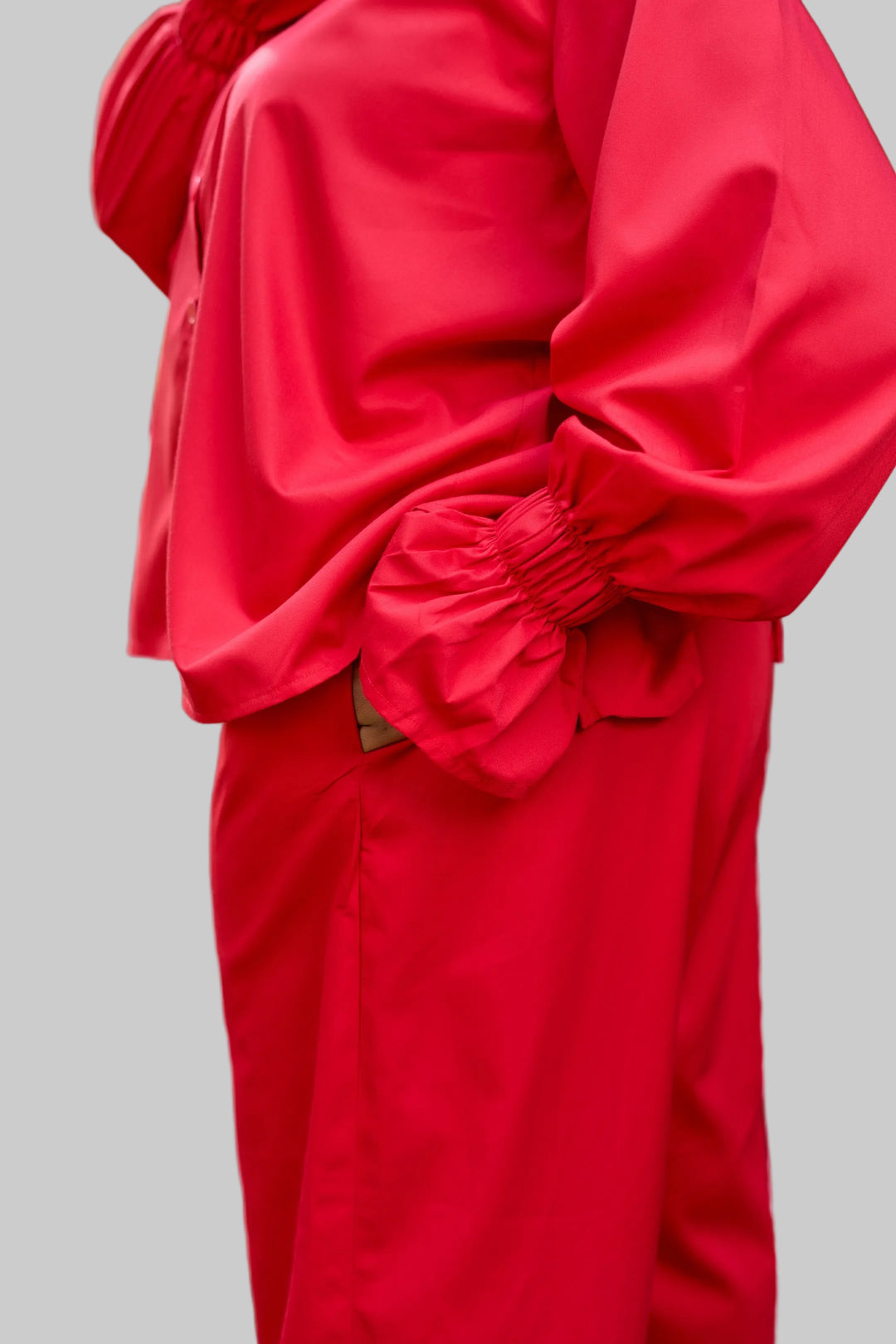 Red raincoat with a blurred background
