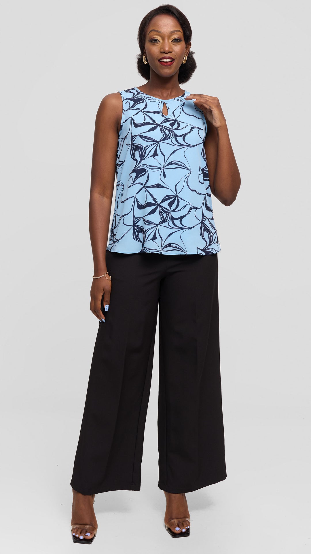 Vivo Sierra Sleeveless Double Layered Top in Chiffon - Light  Blue / Navy Arah Print