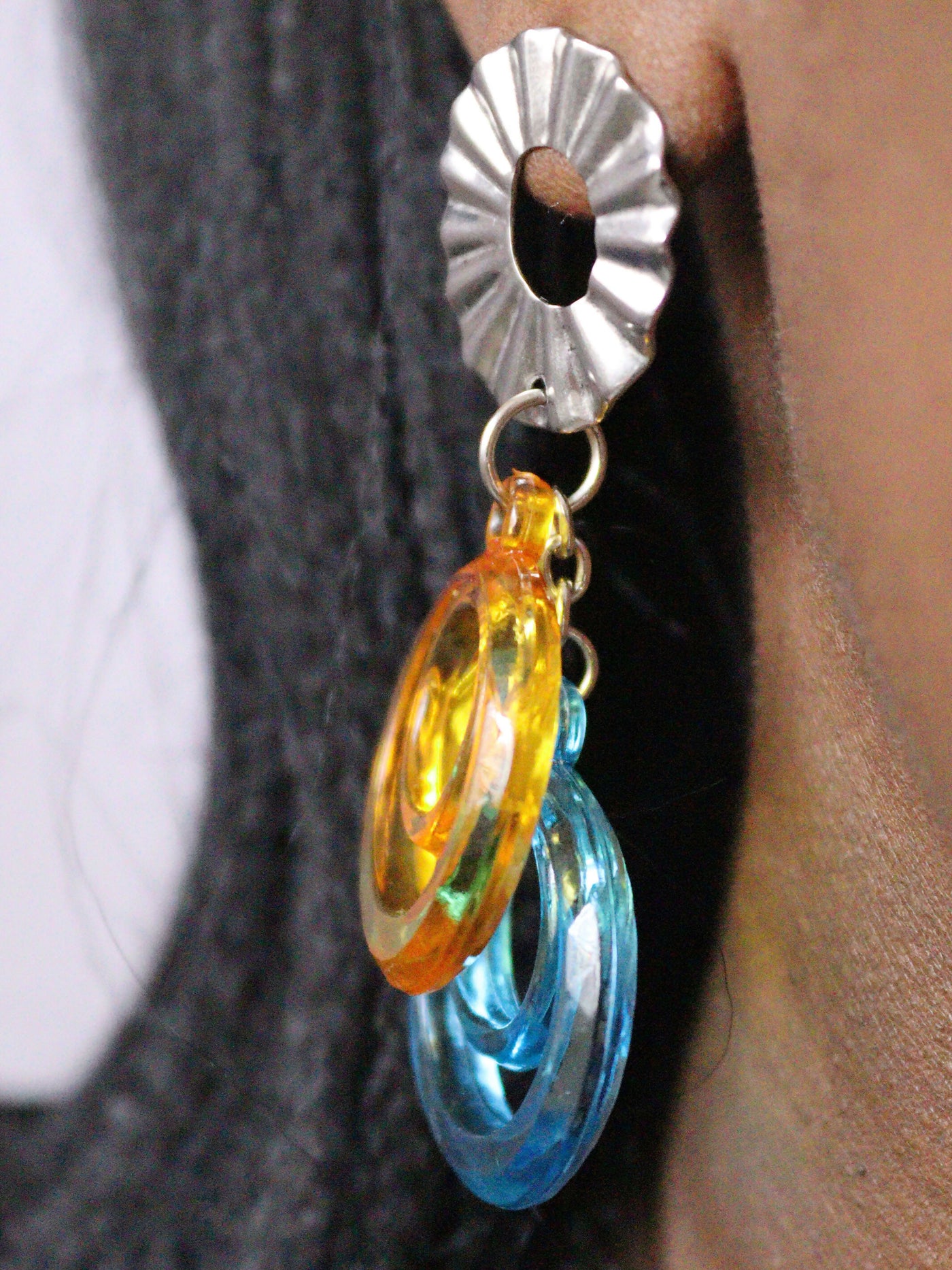 a woman wearing non tarnish, budget friendly stainless steel double o earrings