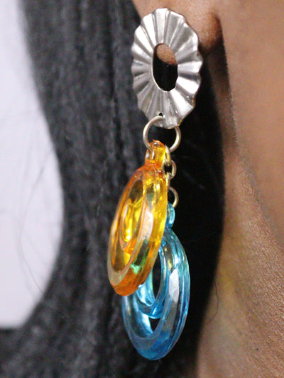 a woman wearing non tarnish, budget friendly stainless steel double o earrings