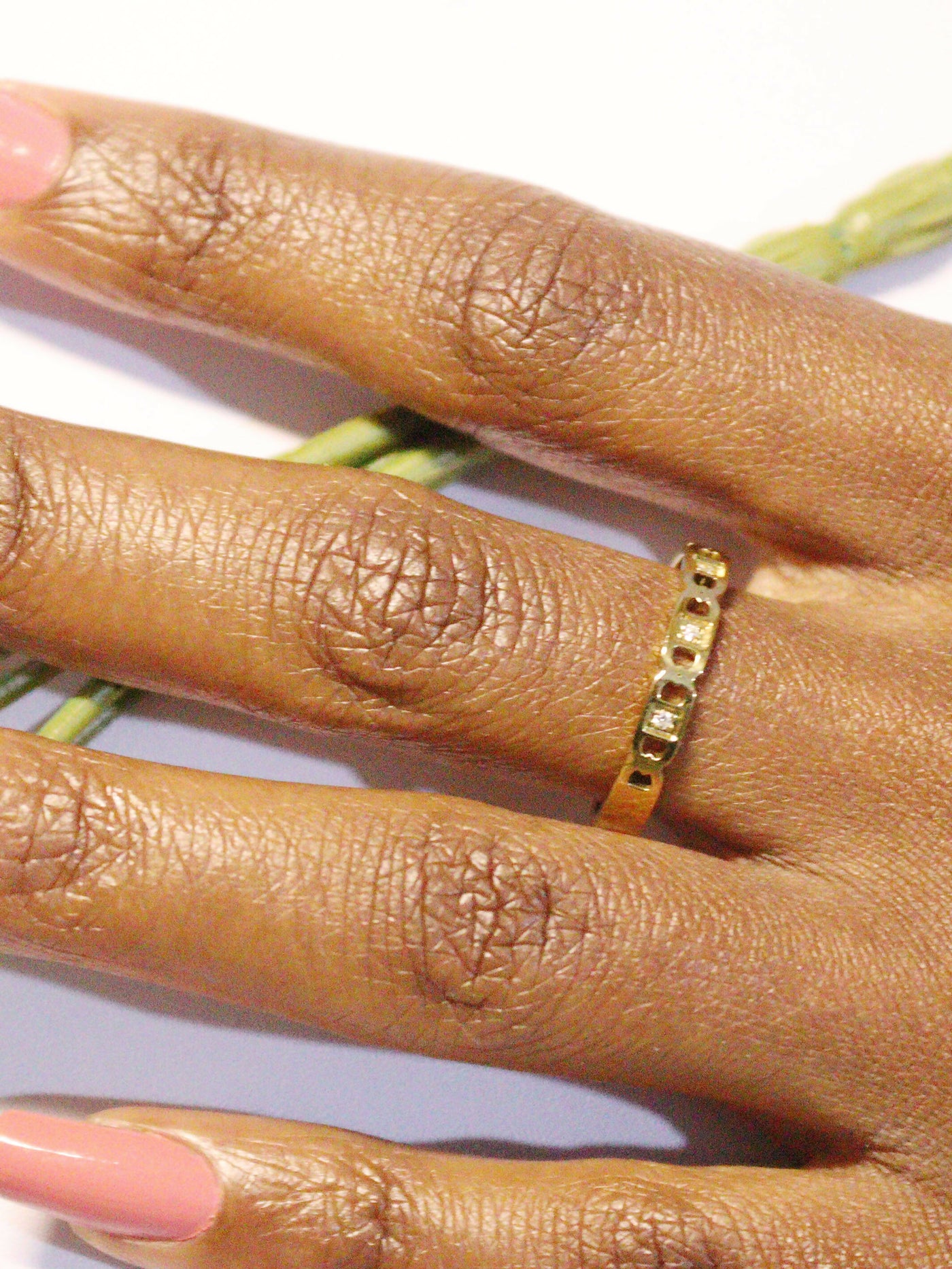 a woman wearing non tarnish, budget friendly 18k gold plated link ring