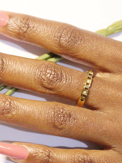 a woman wearing non tarnish, budget friendly 18k gold plated link ring