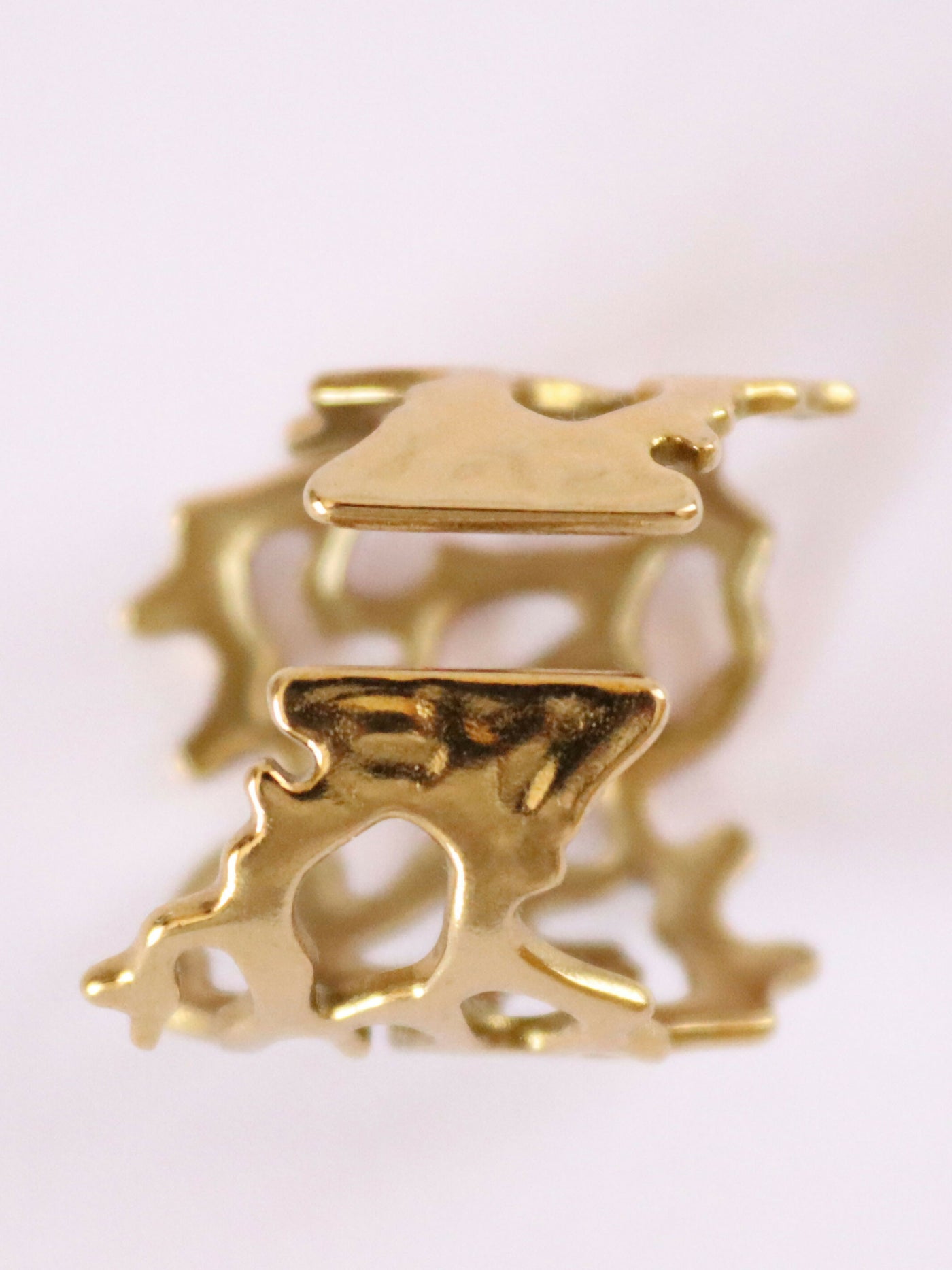 back view of 18k gold plated flowy ring
