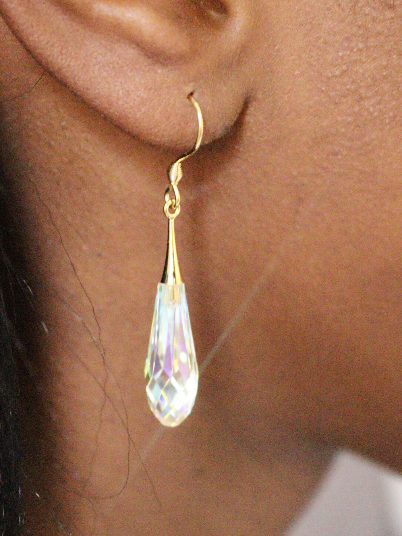 side view of 18k gold plated sparkle earrings