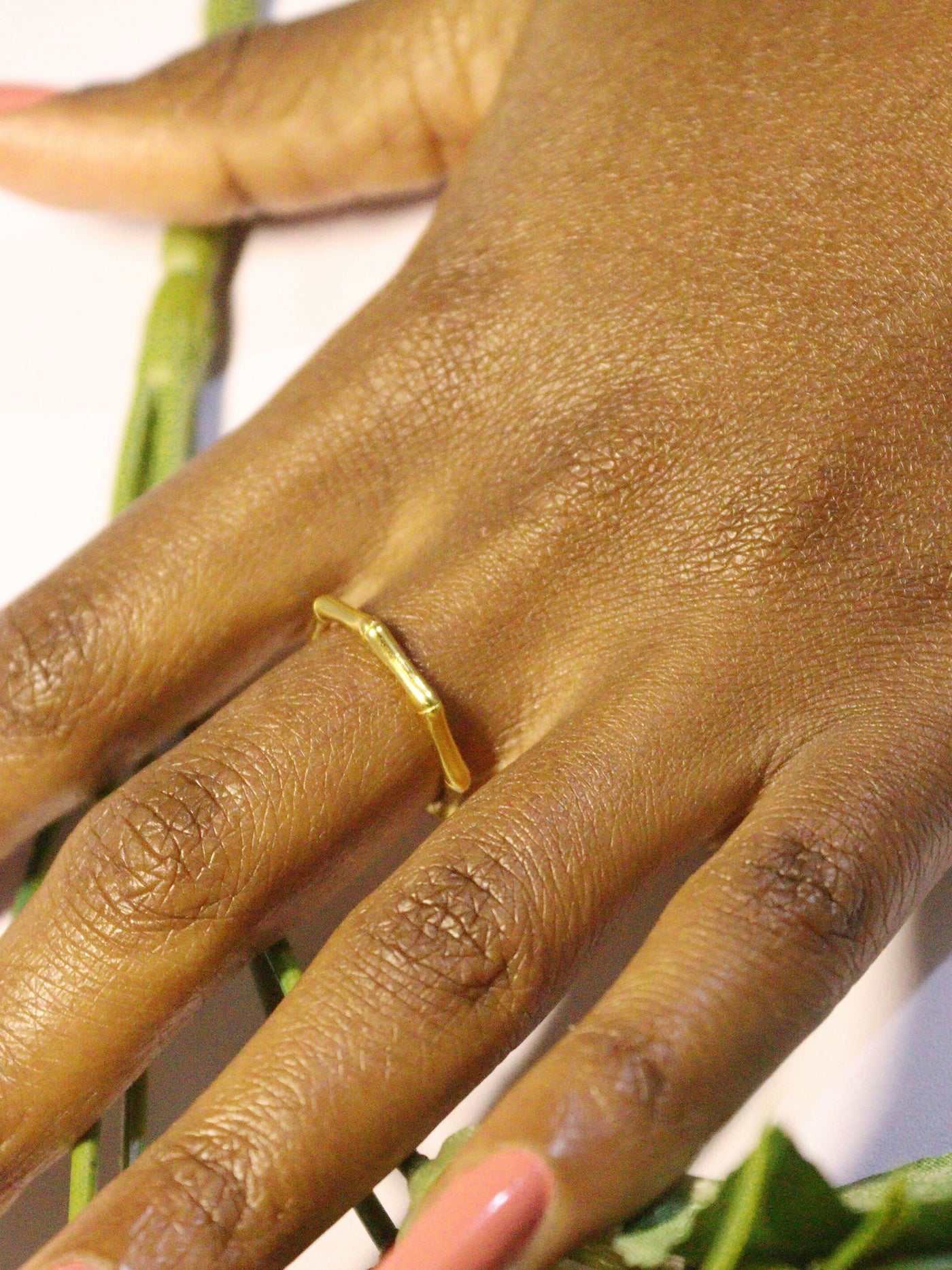 a woman wearing non tarnish, budget friendly 18k gold plated bamboo ring