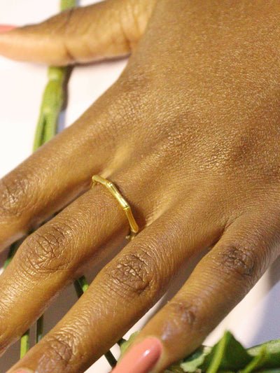 a woman wearing non tarnish, budget friendly 18k gold plated bamboo ring