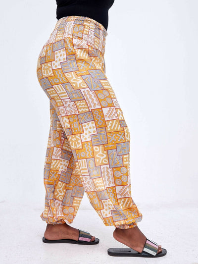 Zola Orange Tribal Print Pants - Orange / Grey - Shop Zetu Kenya